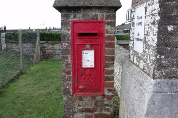 Warehouse worker picking items from shelves demonstrating lo